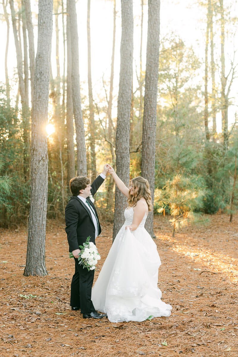 bride and groom posing for Houston wedding photographer 