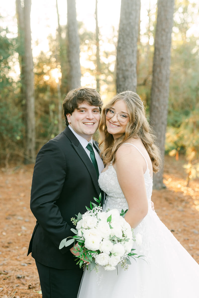 bride and groom posing for Houston wedding photographer 