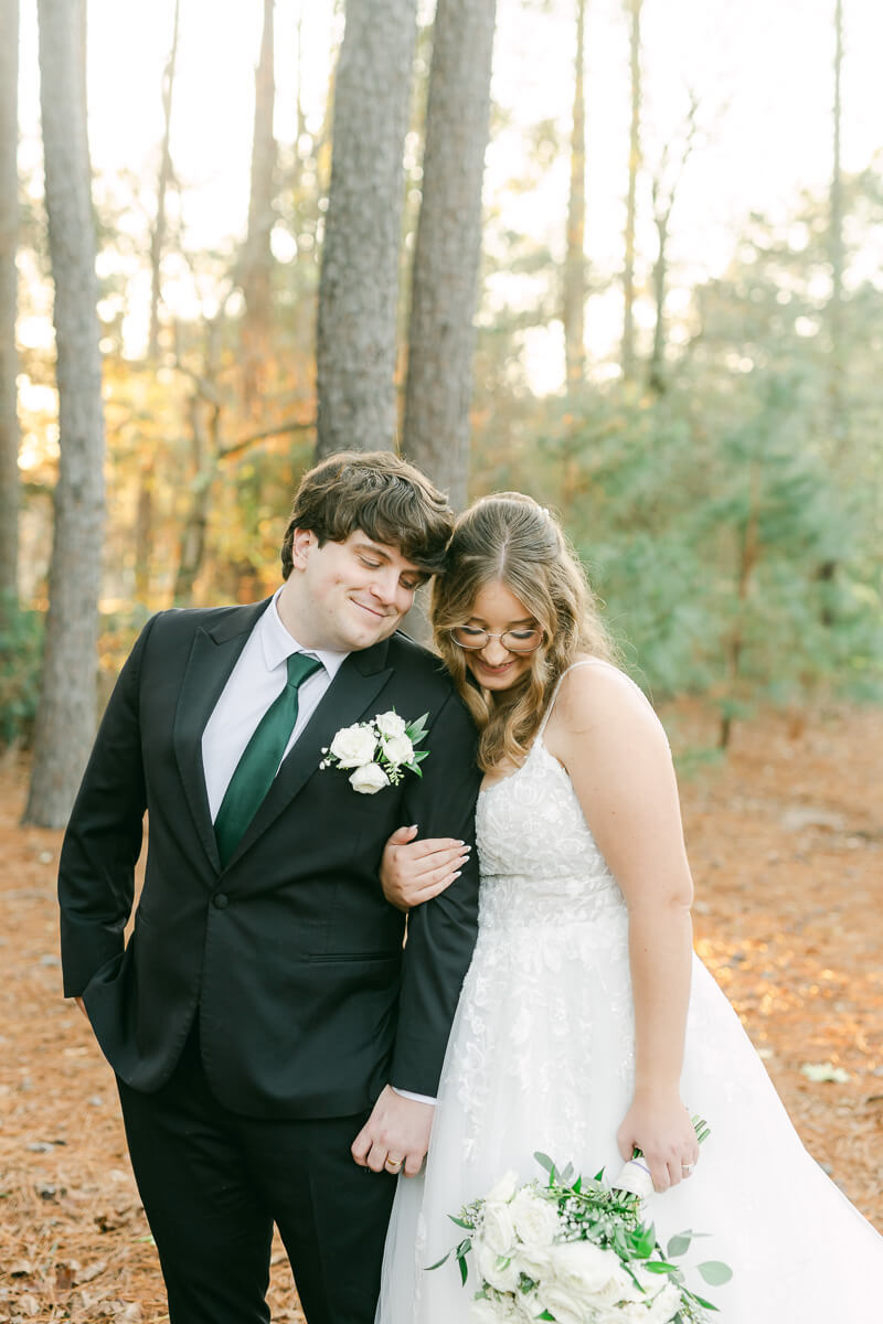 bride and groom posing for Magnolia, Tx wedding photographer 