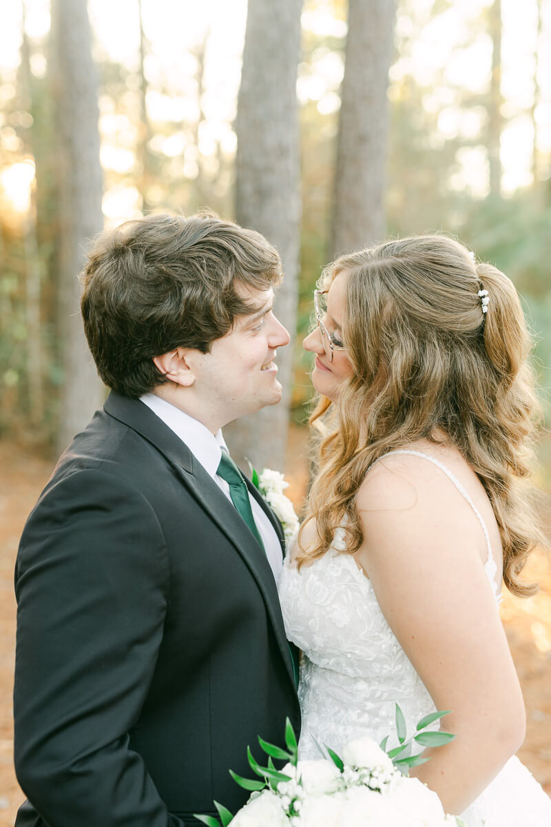 bride and groom posing for Magnolia, Tx wedding photographer 