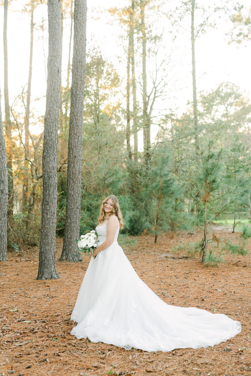 bride posing for Magnolia wedding photographer 