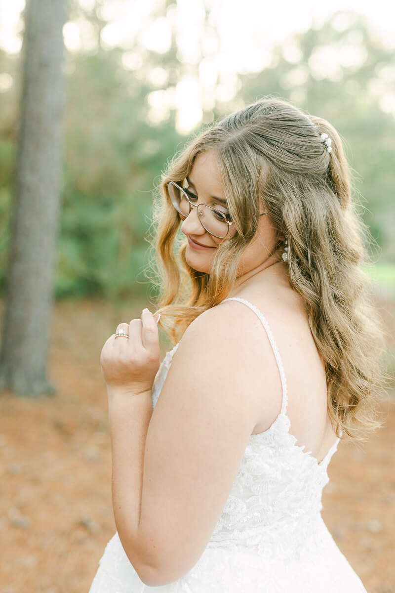 bride posing for Magnolia wedding photographer 