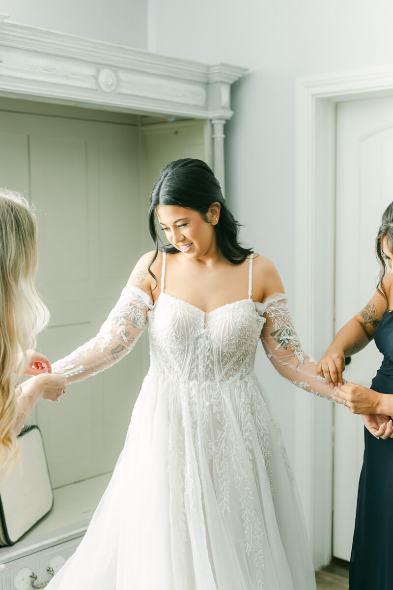 bride getting ready at venue 311 in Plantersville, Tx