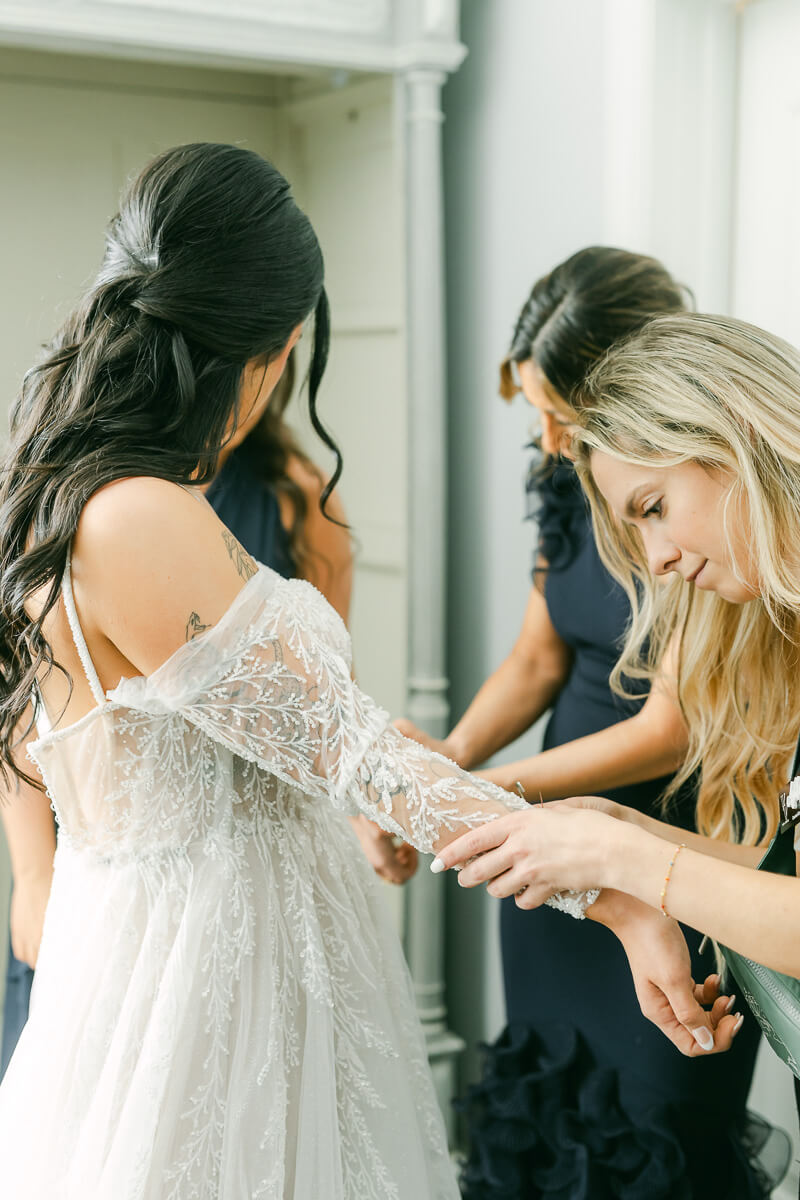 bride getting ready at venue 311 in Plantersville, Tx