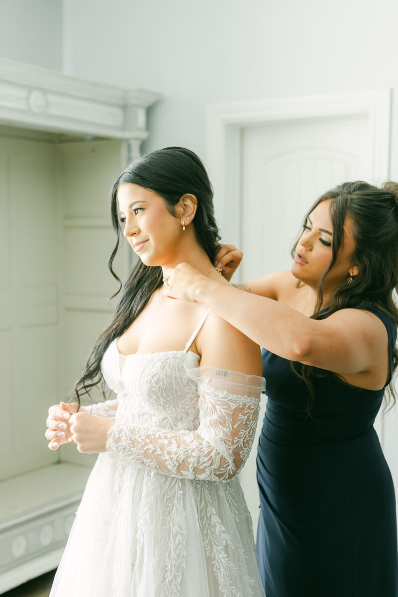 bride getting ready at venue 311 in Plantersville, Tx