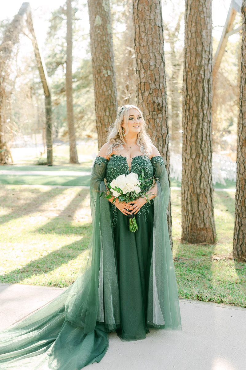 bride wearing emerald green wedding dress at Forever 5 Events