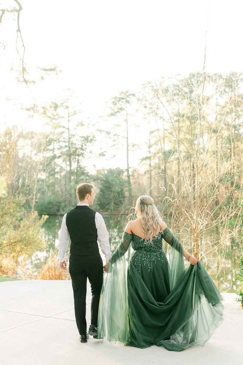 bride and groom walking near lake at Forever 5 Events