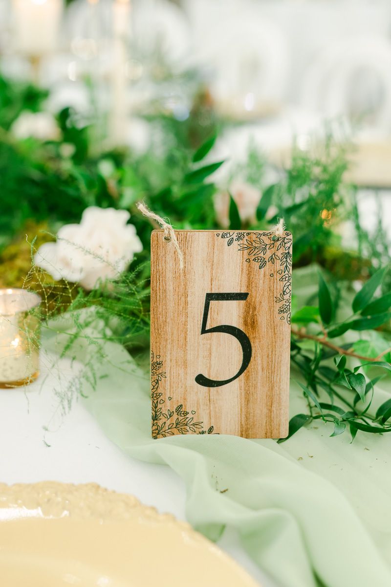 wood table number at wedding reception