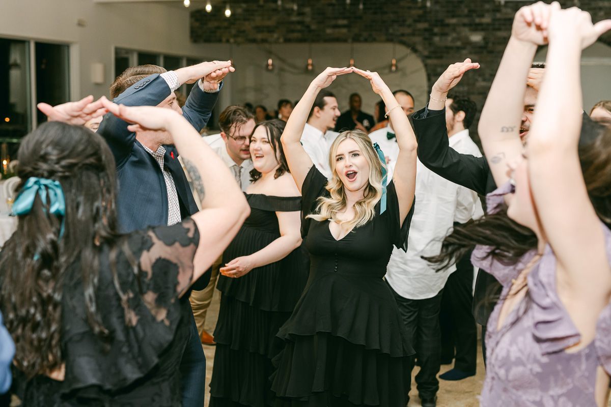 guests dancing in Willow Room at Forever 5 Events