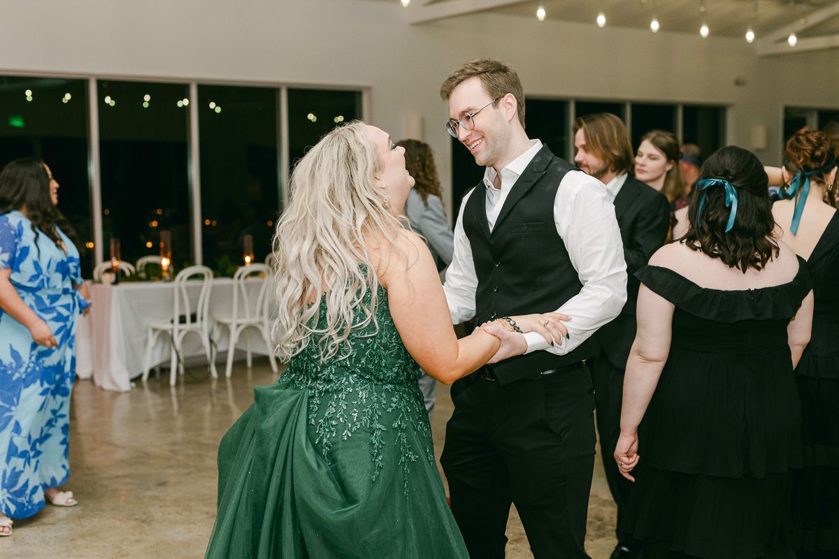 bride and groom dancing in Willow Room at Forever 5 Events