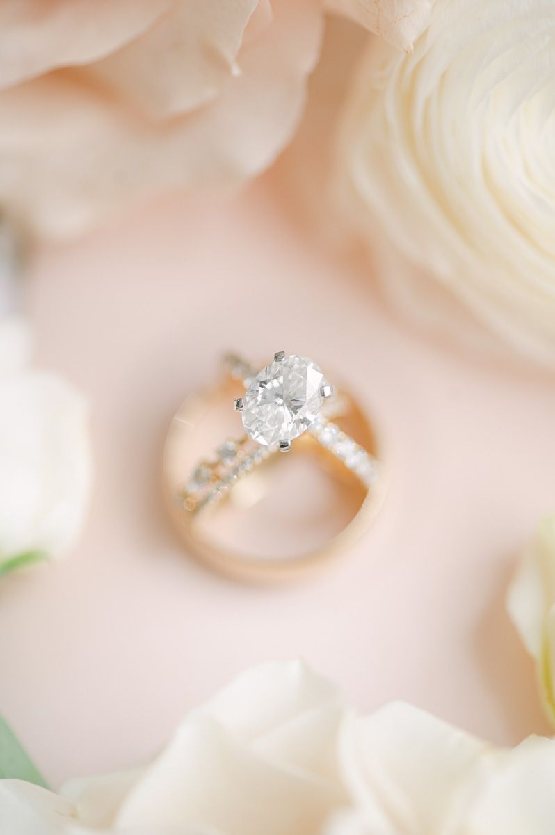 wedding rings on pink background
