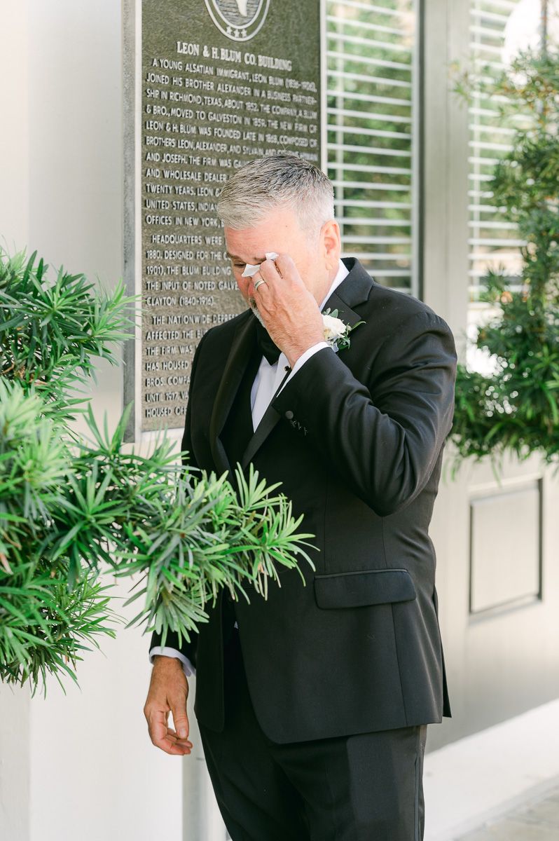 first look with dad outside Galveston Wedding Venue
