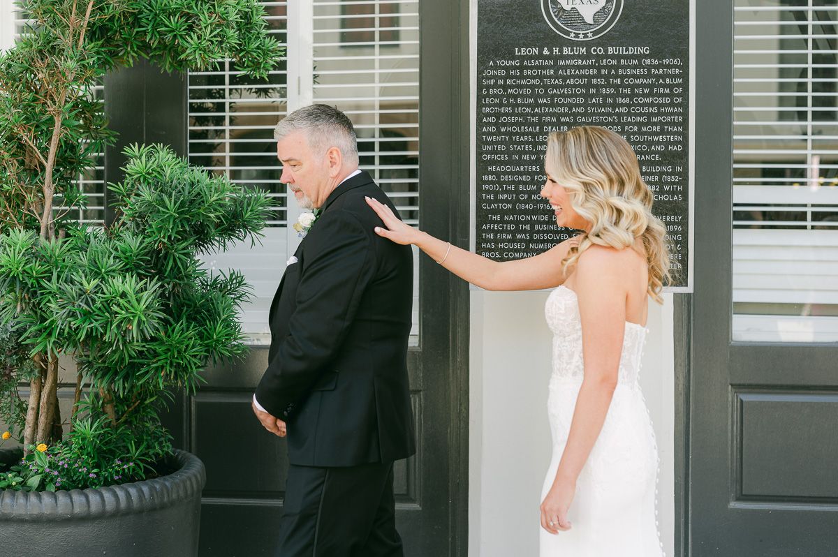 first look with dad outside Galveston Wedding Venue