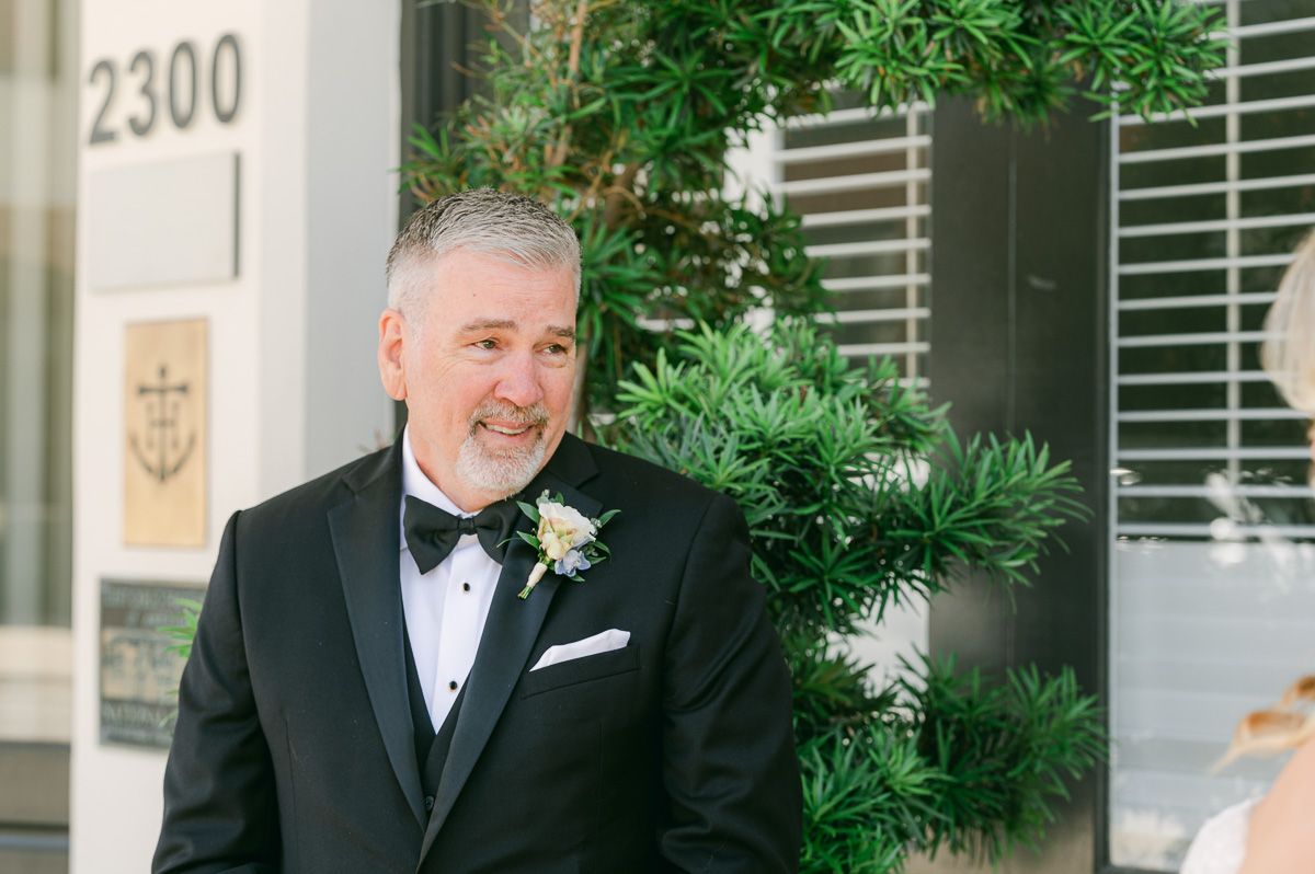 first look with dad outside Galveston Wedding Venue