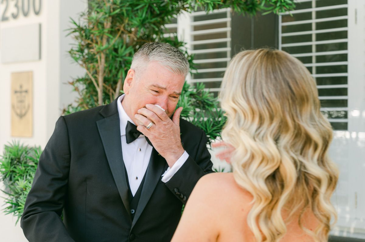 first look with dad outside Galveston Wedding Venue