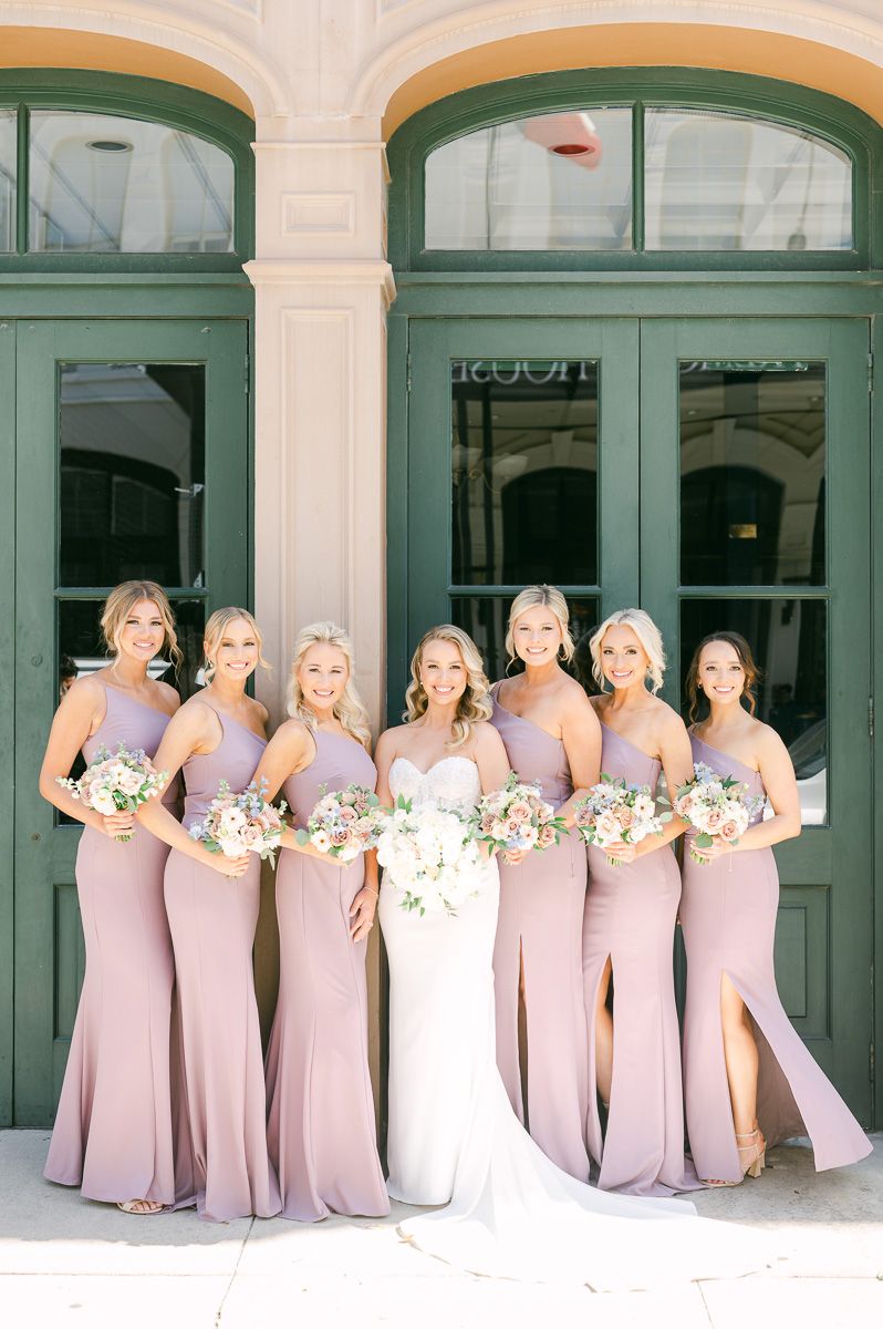 bridesmaids outside Galveston wedding venue