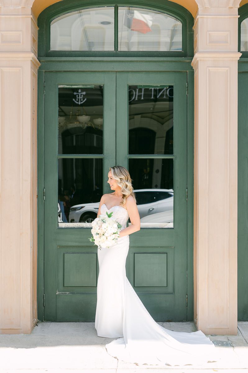 bride outside Galveston wedding venue