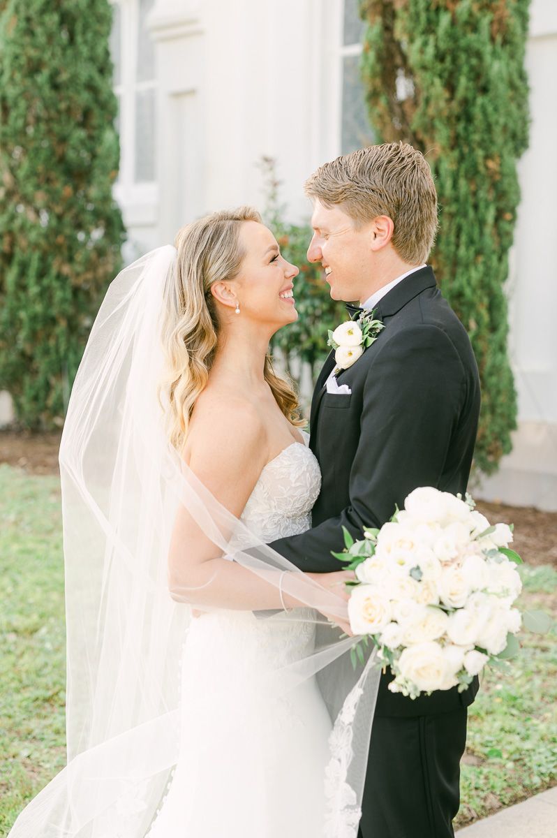 bride and groom outside Galveston wedding venue