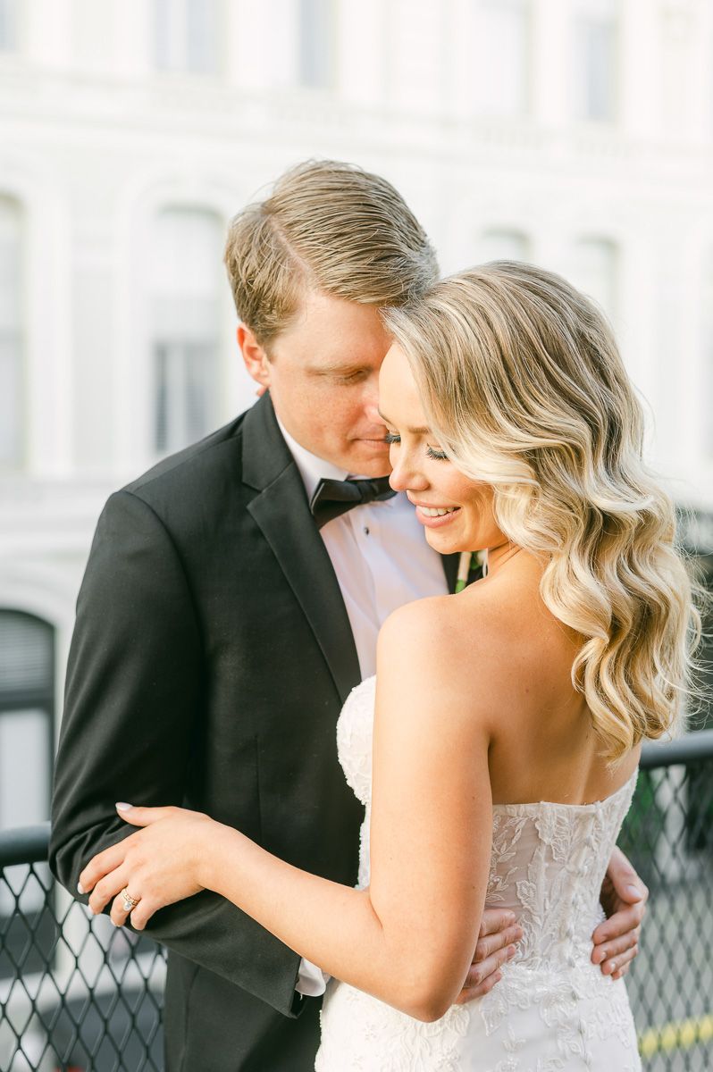 bride and groom on roof of Galveston wedding venue The Tremont House