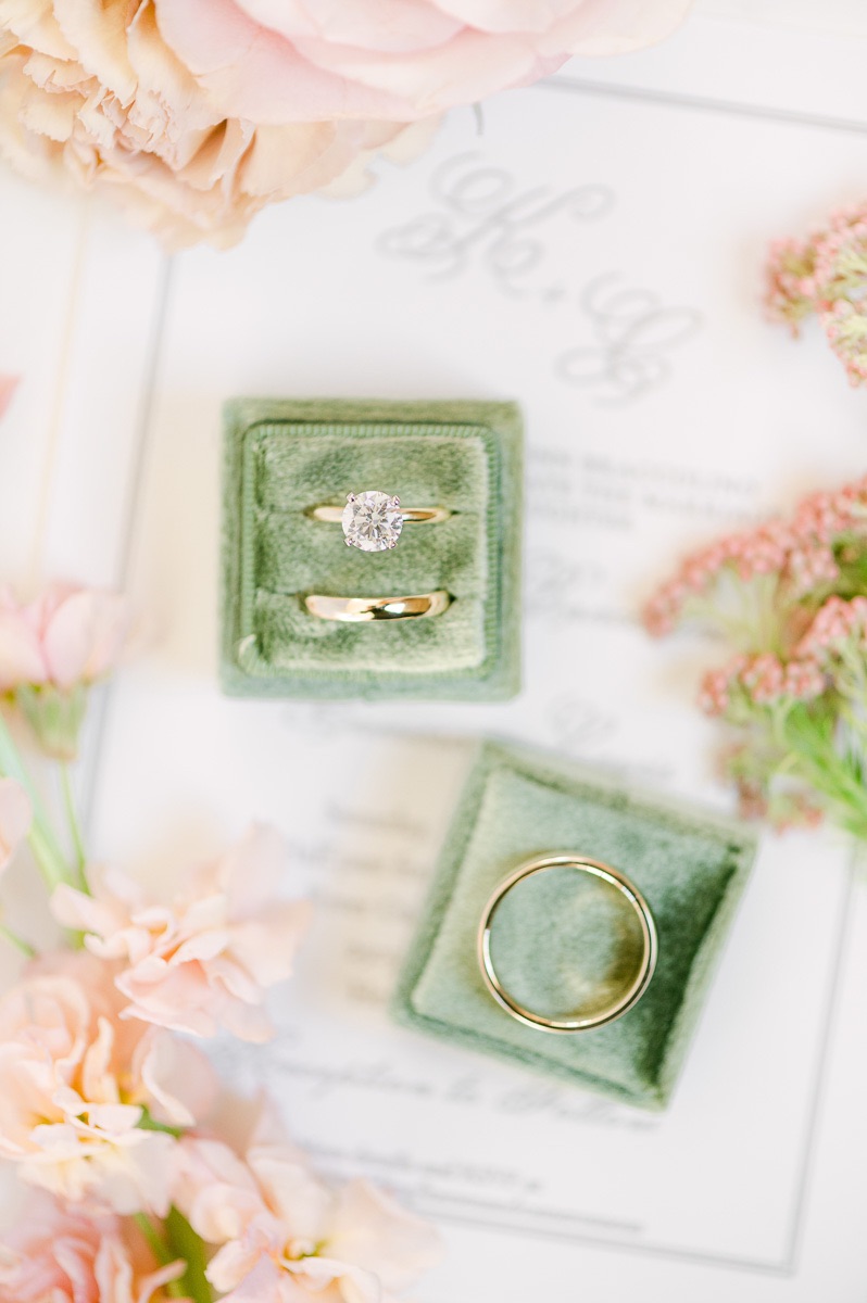 wedding rings in green ring box