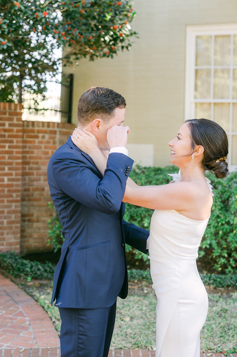 groom crying after first kiss
