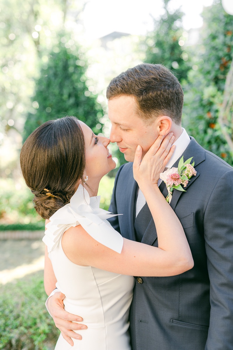 bride and groom cuddling before wedding
