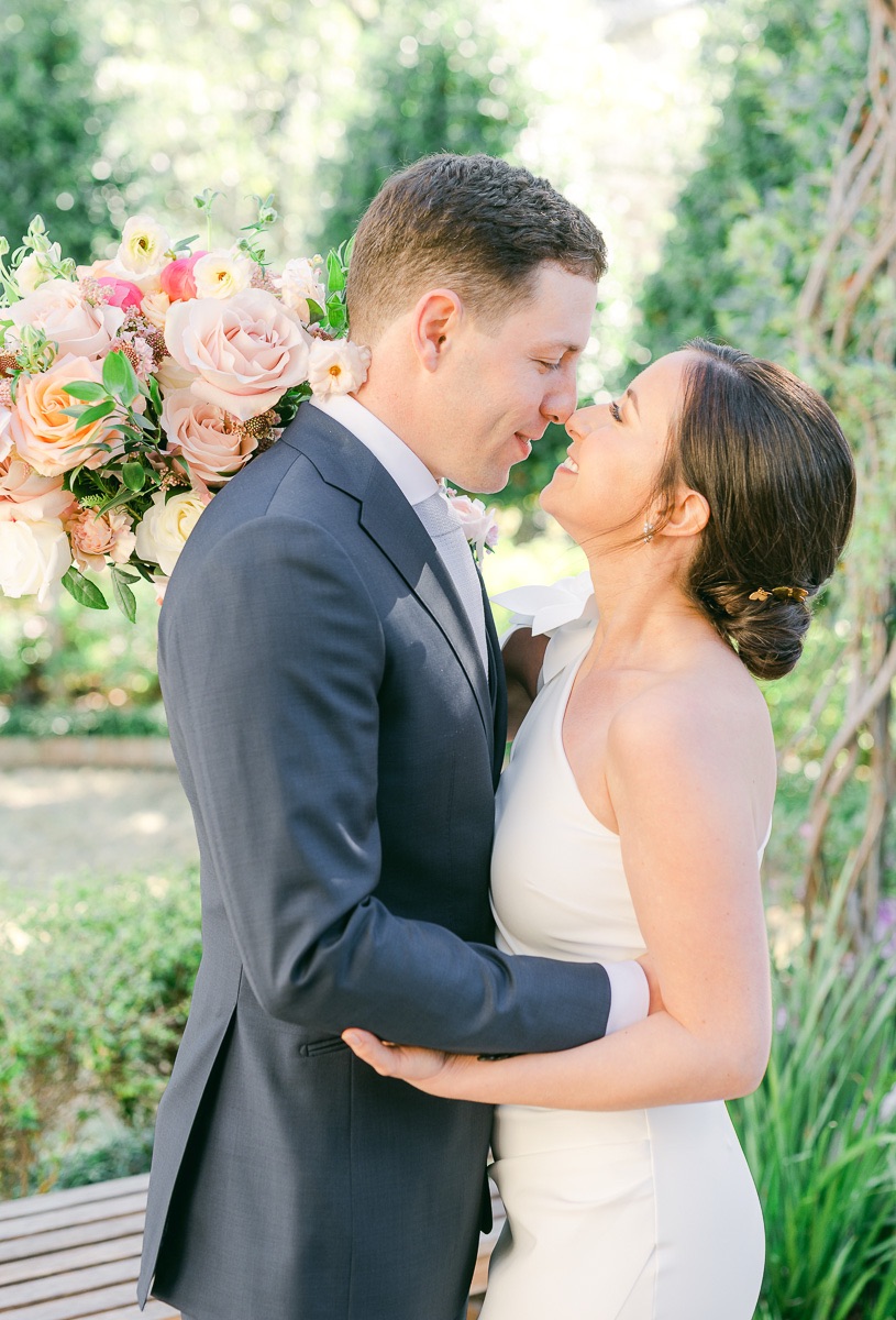 bride and groom cuddling before wedding