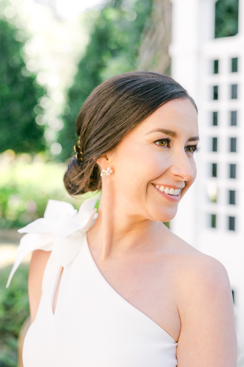 bride with one shoulder wedding dress