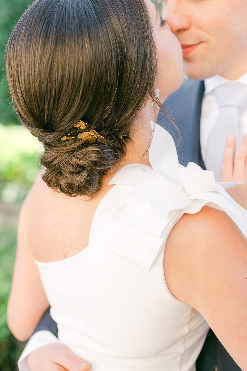 butterfly detail in bride's hair