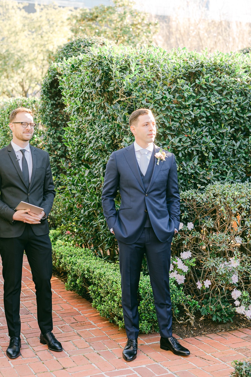 groom seeing his bride at river oaks garden club wedding ceremony