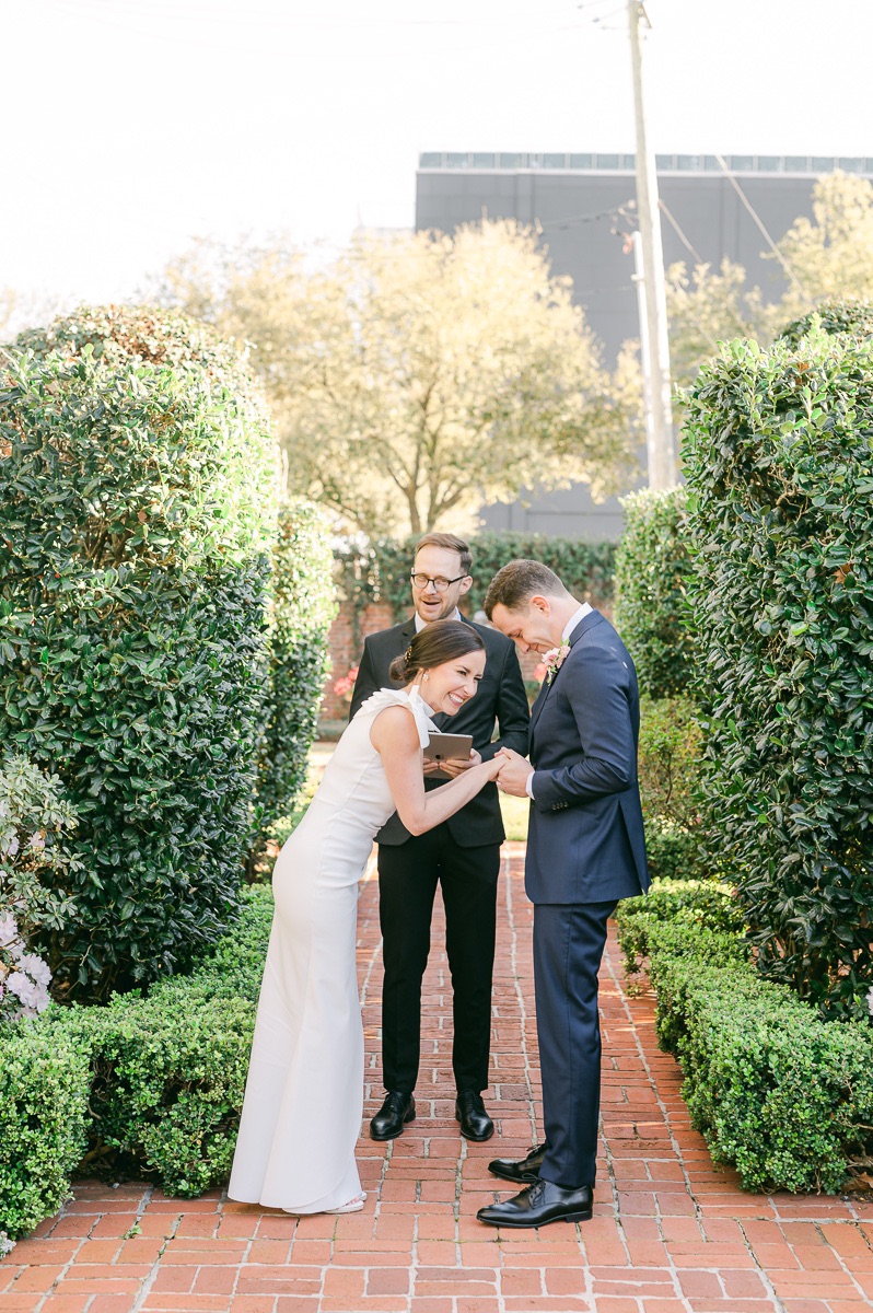 couple laughing at their river oaks garden club wedding ceremony