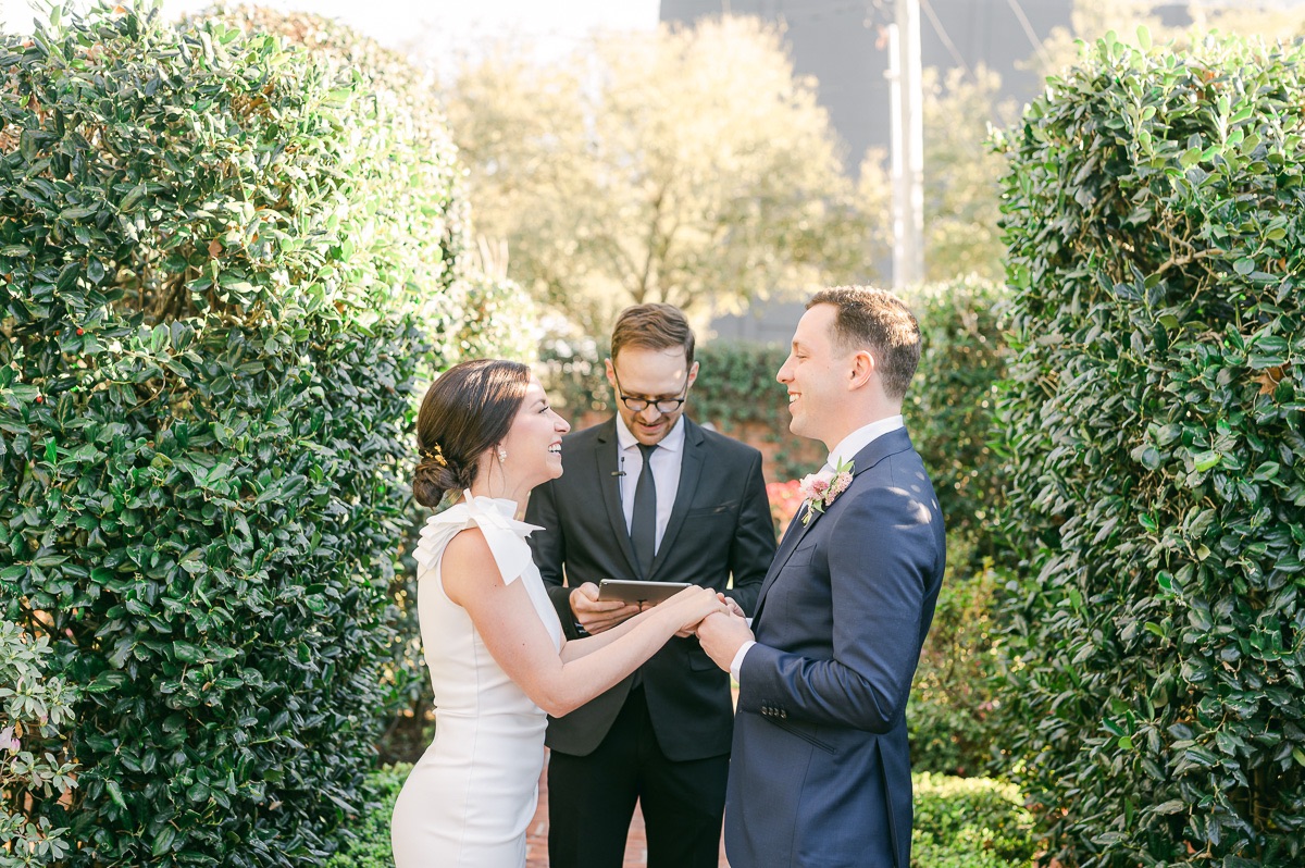 couple laughing at their river oaks garden club wedding ceremony