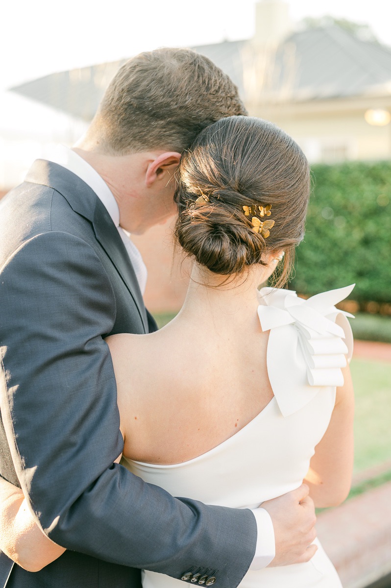 bridal hair detail with butterfly hairpiece