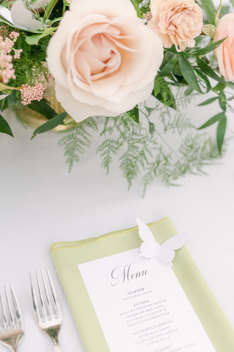 green wedding menu with butterfly detail