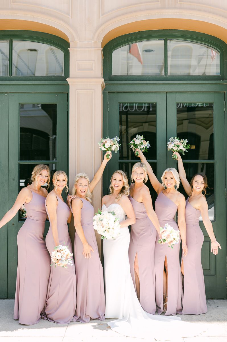 bridesmaids outside Galveston wedding venue