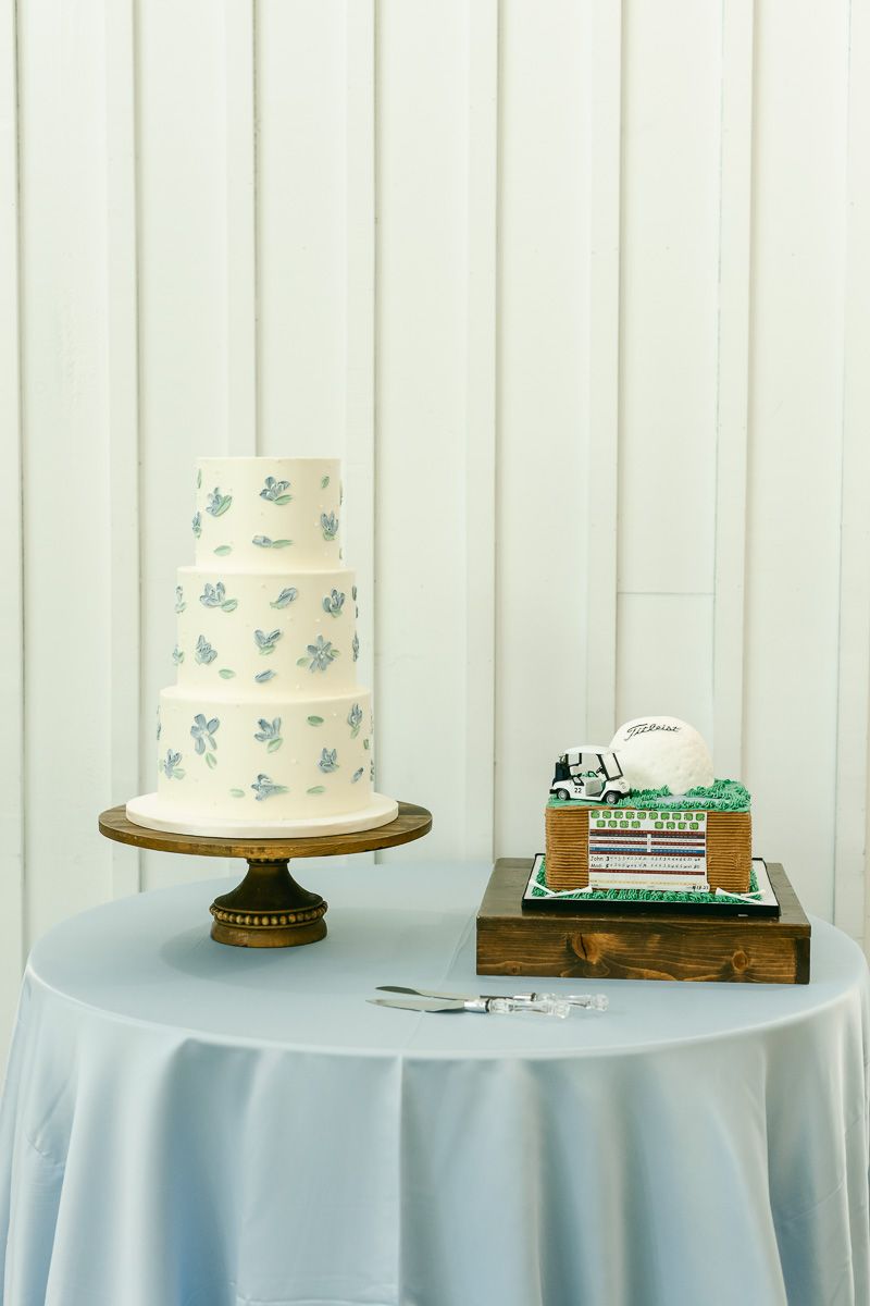 blue floral wedding cake with groom's cake