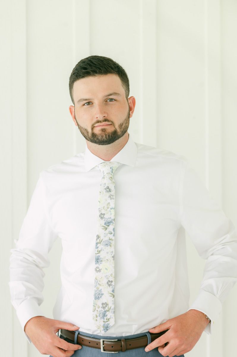 groom getting ready for wedding in Montgomery, Tx