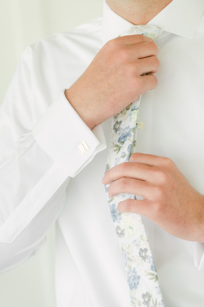 groom getting ready for wedding in Montgomery, Tx