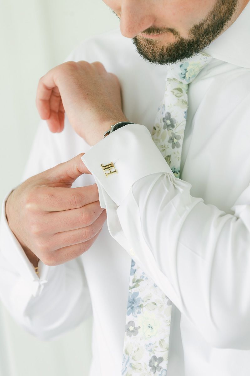 groom getting ready for wedding in Montgomery, Tx