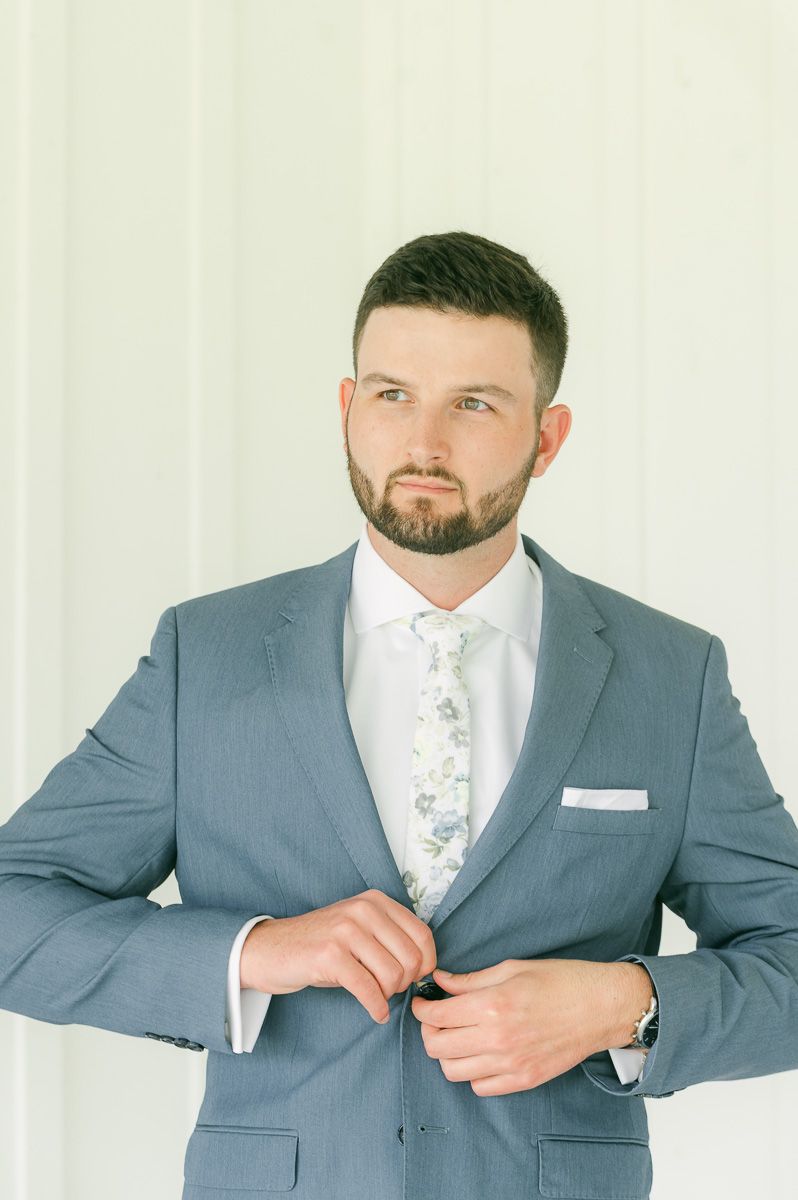 groom getting ready for wedding in Montgomery, Tx