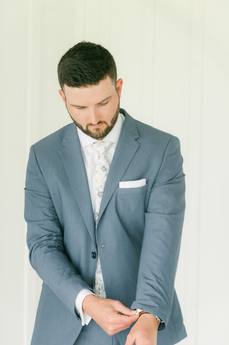 groom getting ready for wedding in Montgomery, Tx