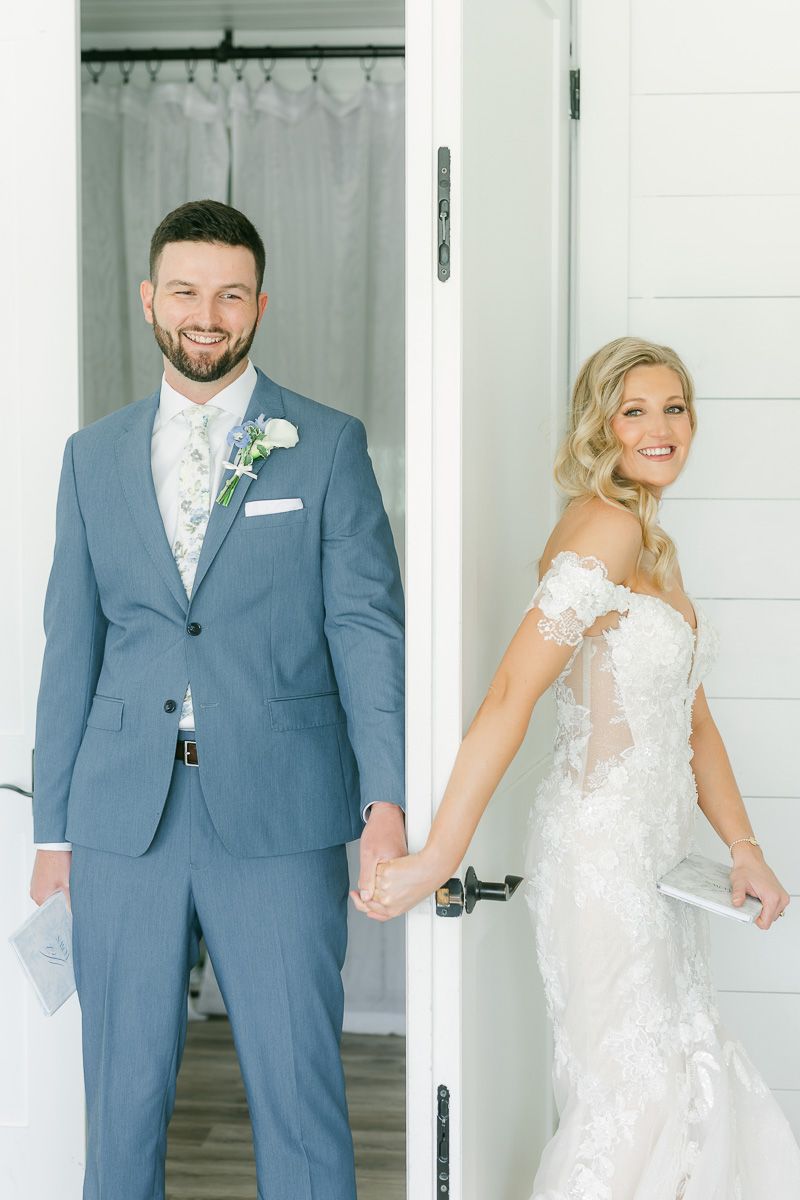 bride and groom reading private vows