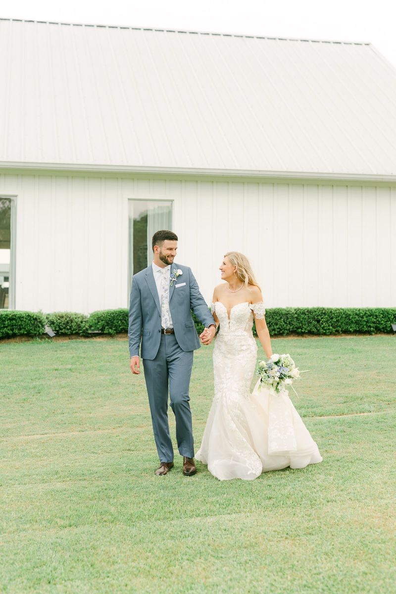 bride and groom walking at their wedding in Montgomery, Tx