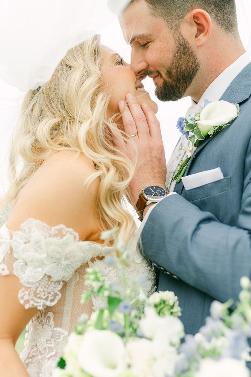 bride and groom at the farmhouse wedding venue