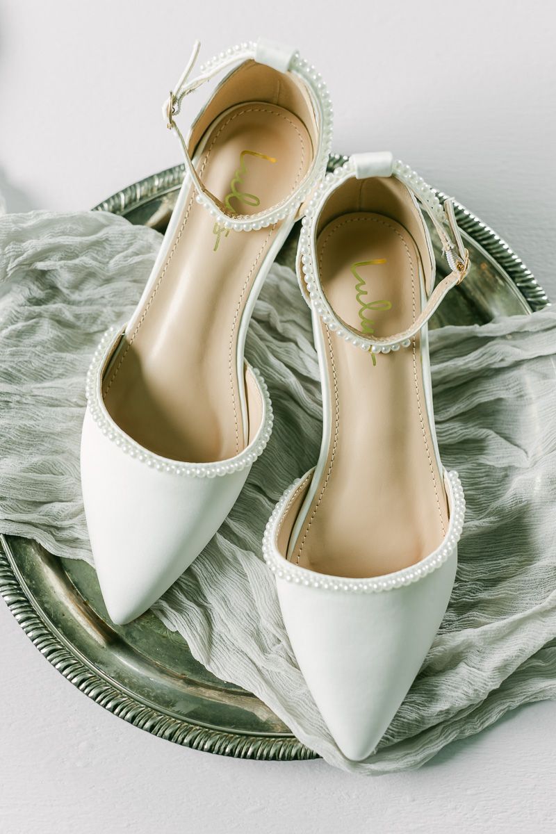 wedding shoes on antique dish
