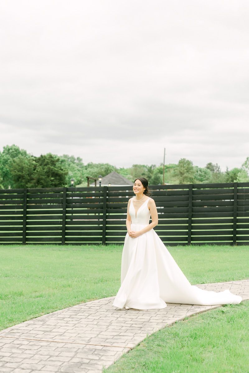 bride walking to first look