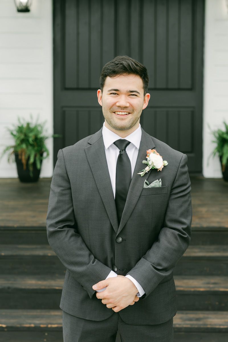 groom outside chapel at Venue 311