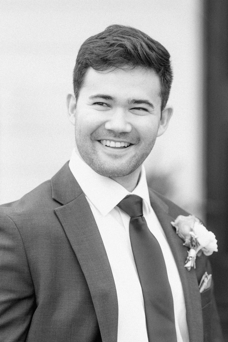 groom outside chapel at Venue 311