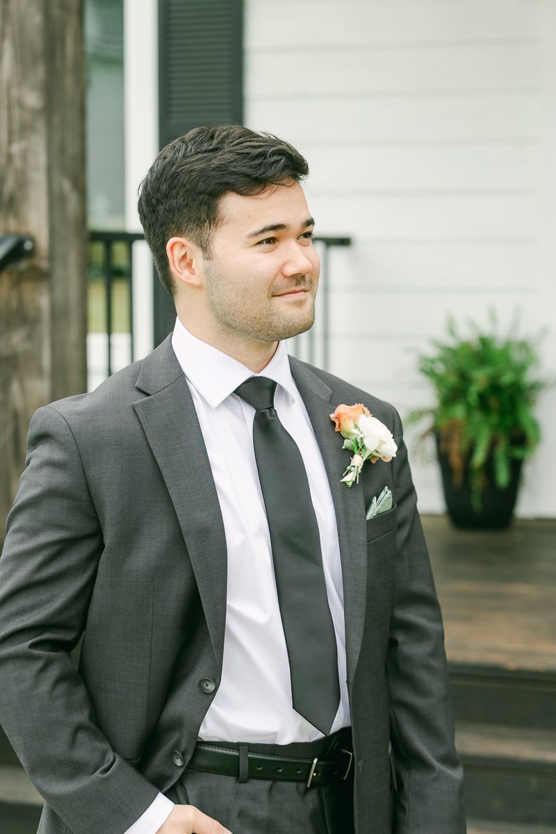 groom outside chapel at Venue 311