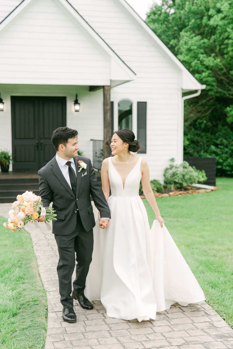 couple walking at their wedding in Plantersville, Tx